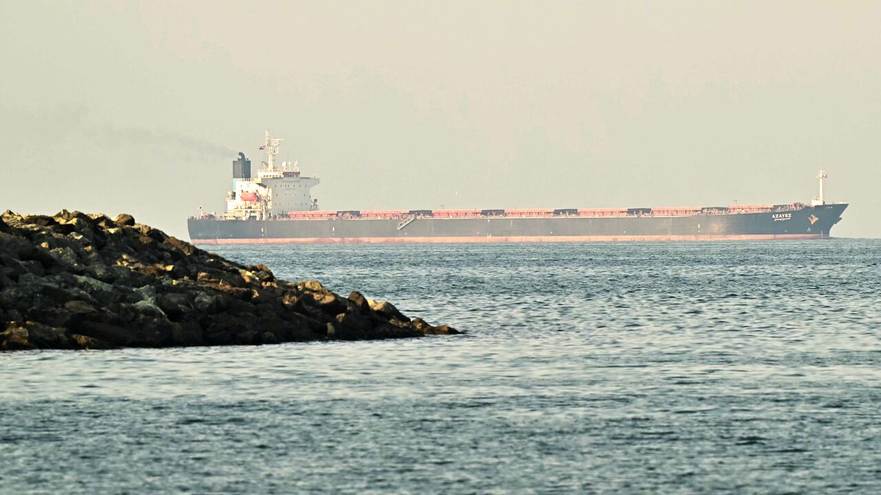 A cargo ship is pictured off coast city of Fujairah, in the Strait of Hormuz in the northern Emirate, on Feb. 25, 2026. 