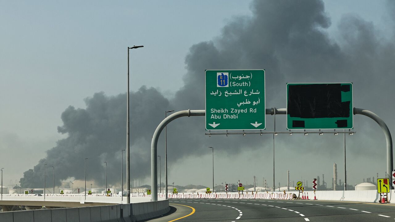 A plume of smoke rises from the port of Jebel Ali following a reported Iranian strike in Dubai on March 1, 2026. 
