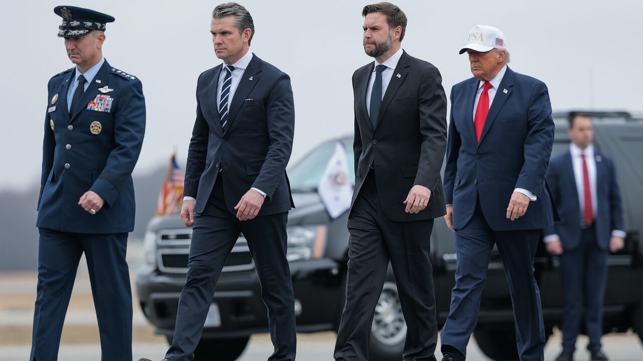 (L-R) Chairman of the Joint Chiefs Of Staff Gen. Dan Caine, U.S. Secretary of War Pete Hegseth, U.S. Vice President JD Vance and U.S. President Donald Trump arrive for a dignified transfer event at Dover Air Force Base March 7, 2026 in Dover, Delaware. 