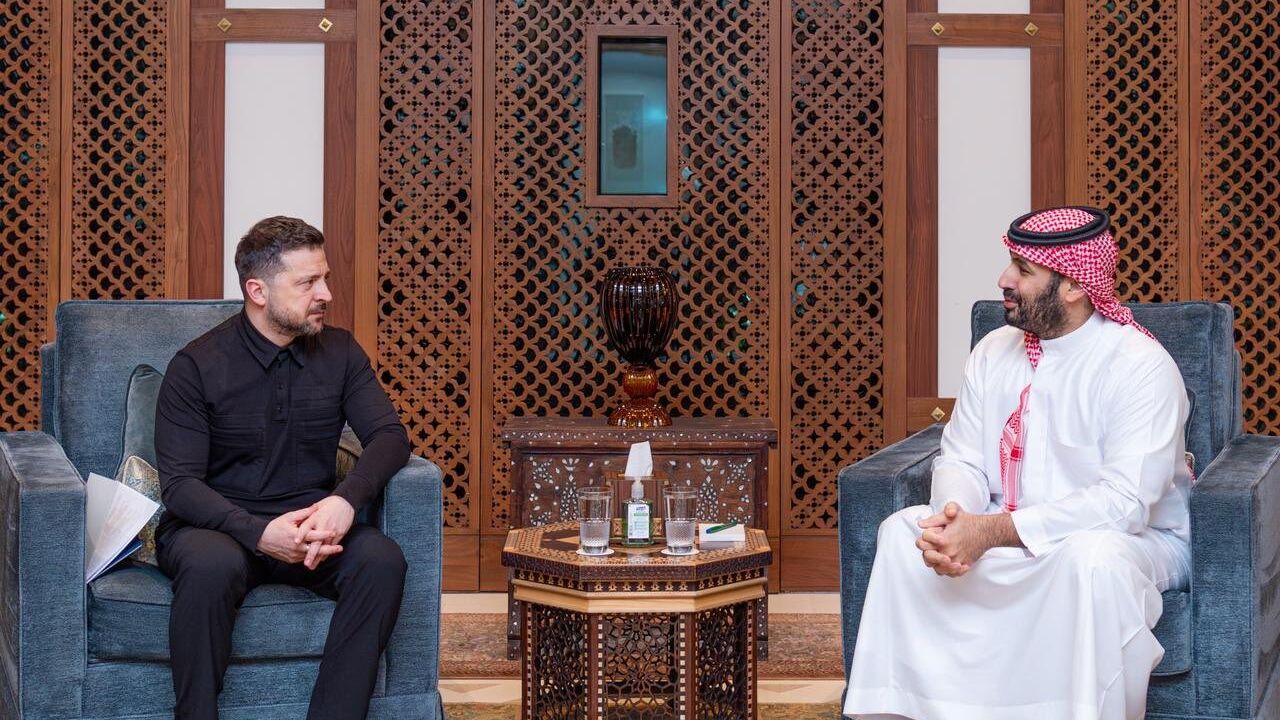 Ukrainian President Volodymyr Zelenskyy sits across from Saudi Arabia's Crown Prince Mohammad bin Salman in Jeddah, Saudi Arabia. 