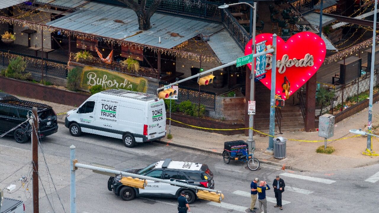 Three people were killed and 14 wounded in a shooting in downtown Austin that the FBI said may be 'terrorism'