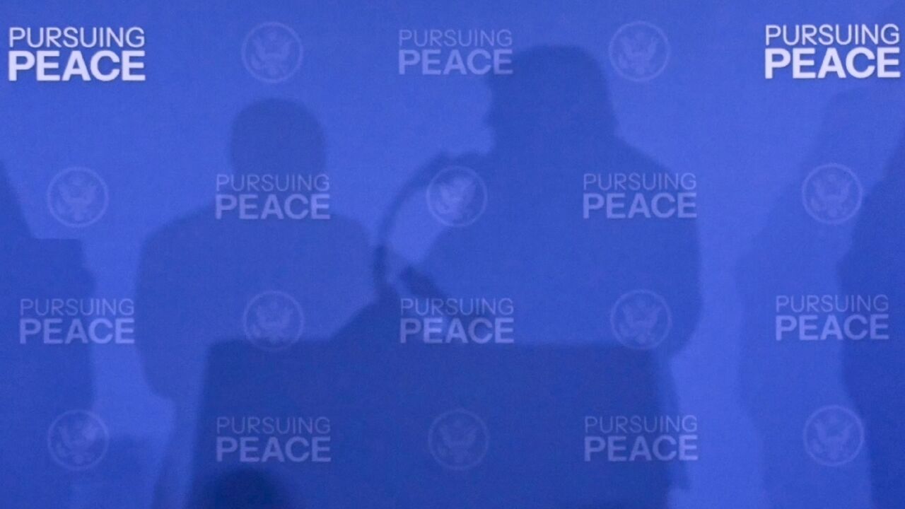 The shadows of US President Donald Trump and Russian President Vladimir Putin seen at their 2025 summit in Anchorage