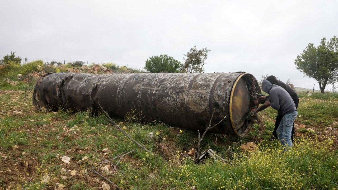 Remnants of an missile that landed in the Israeli-occupied West Bank village of Beitin on March 26, 2026