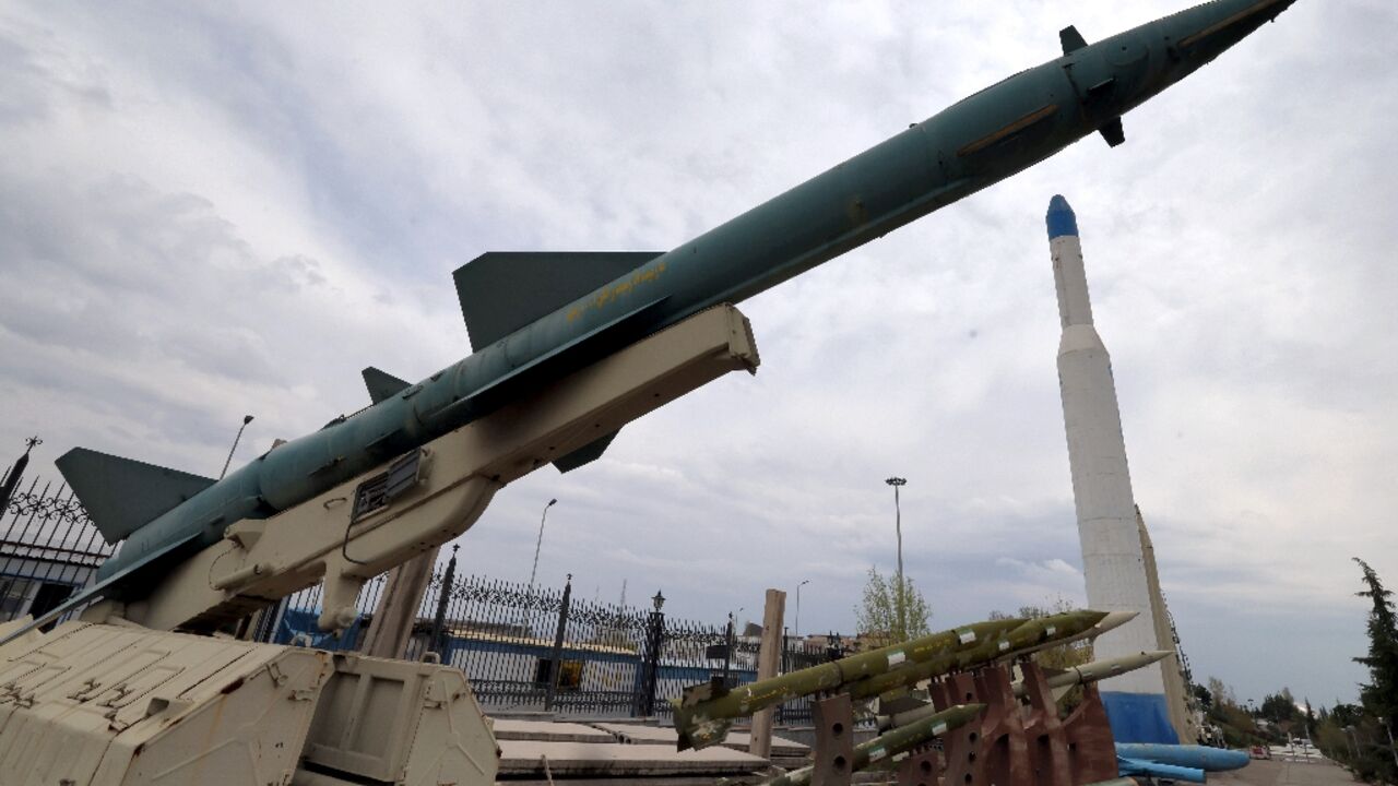 Mockups of Iranian-made missiles are displayed at an exhibition outside the Defence Museum in Tehran