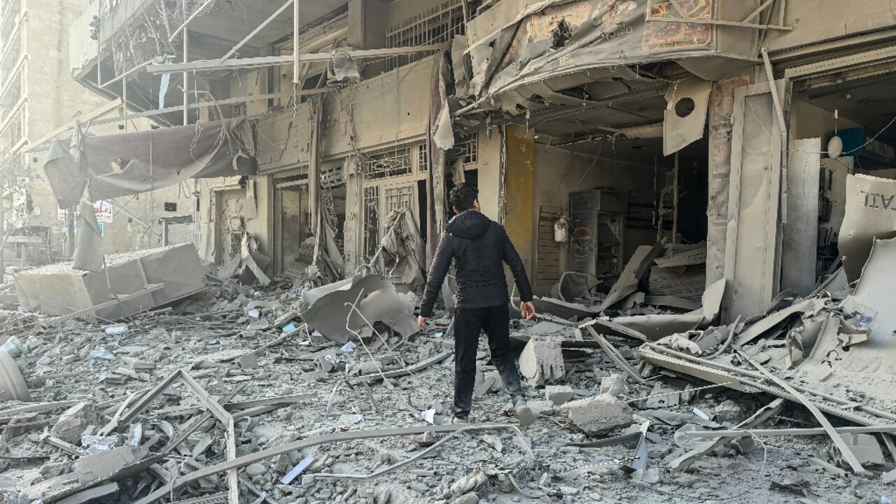 Debris at the site of overnight Israeli airstrikes in the southern suburbs of Beirut