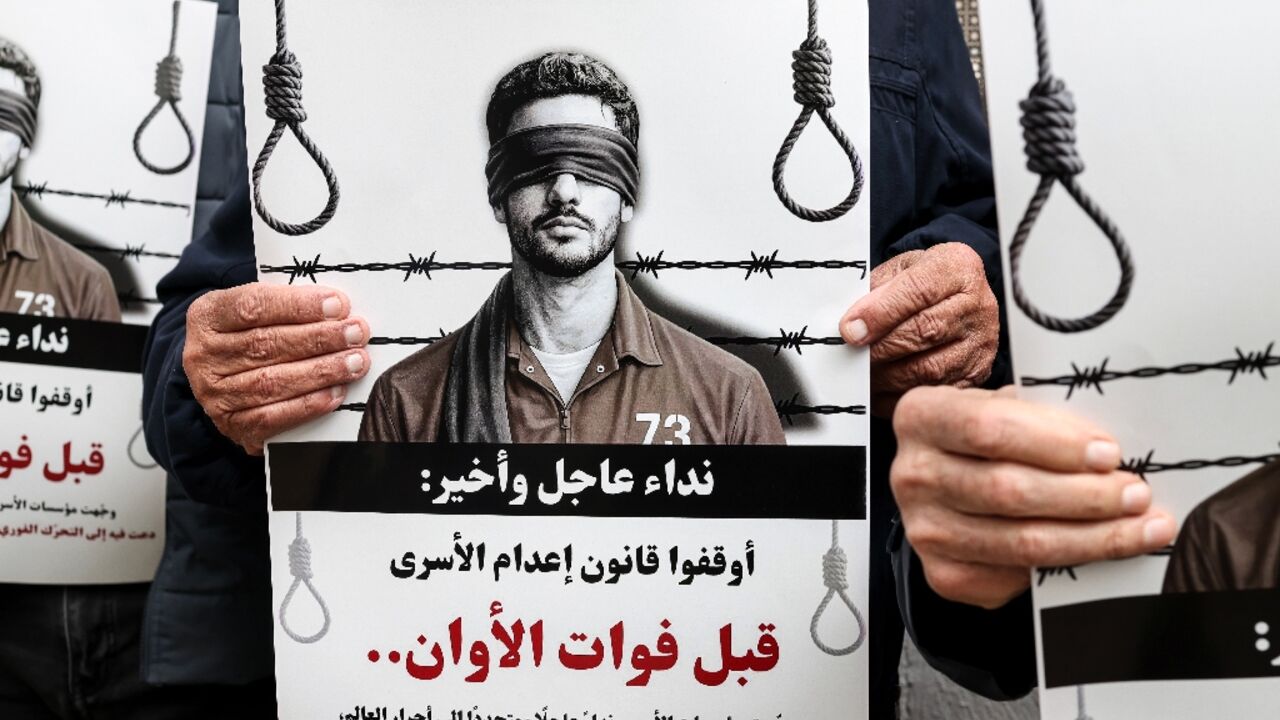 Palestinians in the Israeli-occupied West Bank protest against the new death penalty passed by Israeli parliament