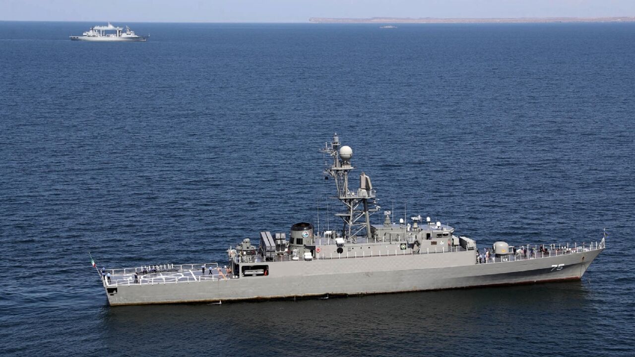 The Iranian navy frigate IRIS Dena (75) is pictured at sea during combined exercises between Iran, Russia and China in the Gulf of Oman in March 2024, in this handout picture from the Iranian Defence Ministry