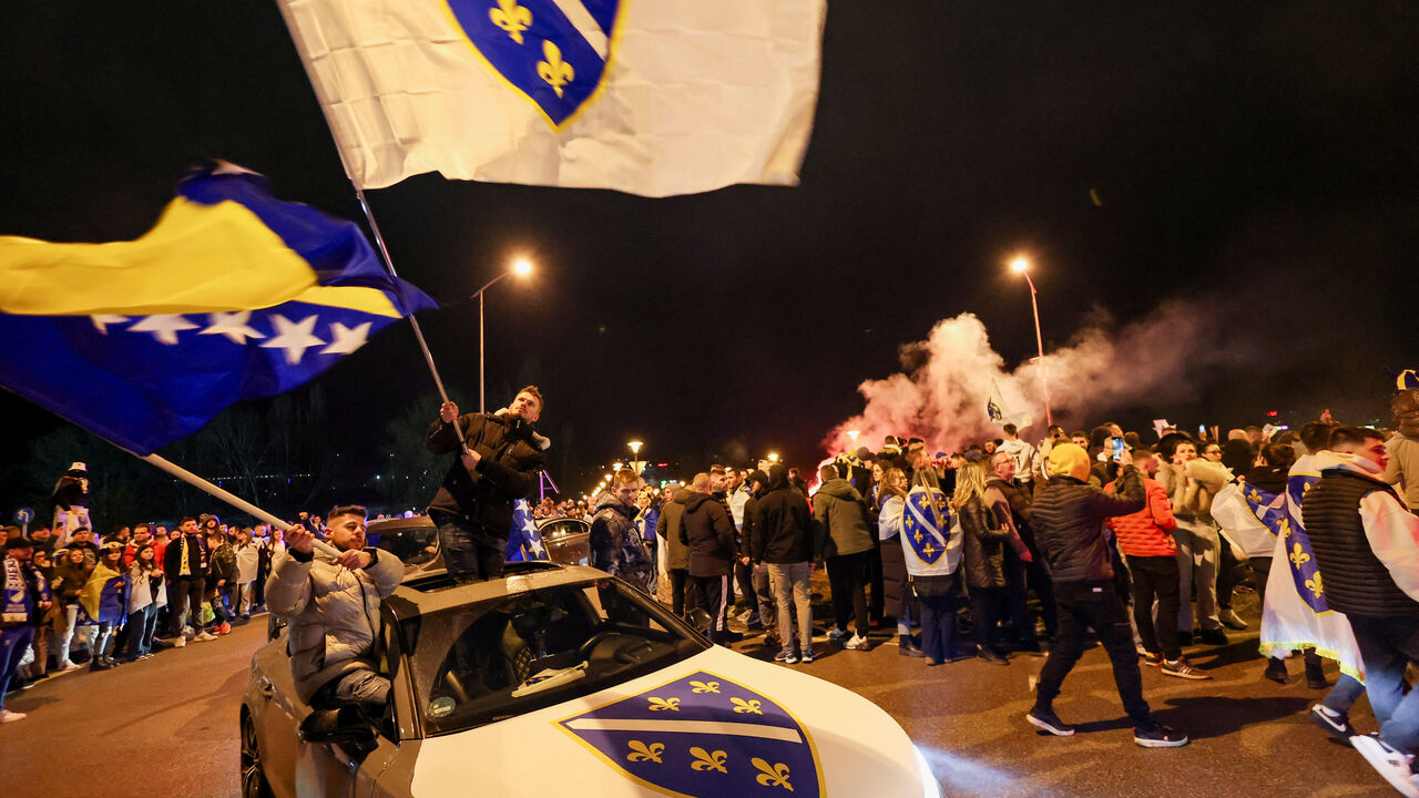 Bosnian supporters celebrate after Bosnia and Herzegovina beat Italy on penalties in a FIFA World Cup 2026 European playoff final, in Zenica, Bosnia and Herzegovina, April 1, 2026. REUTERS/Amel Emric
