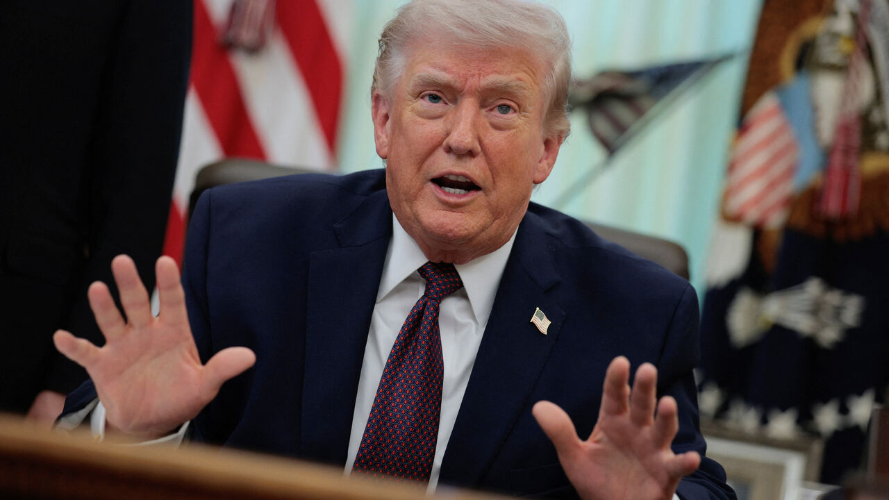 U.S. President Donald Trump speaks during the signing ceremony for an executive order on mail ballots, in the Oval Office of the White House in Washington, D.C., March 31, 2026.  REUTERS/Evan Vucci