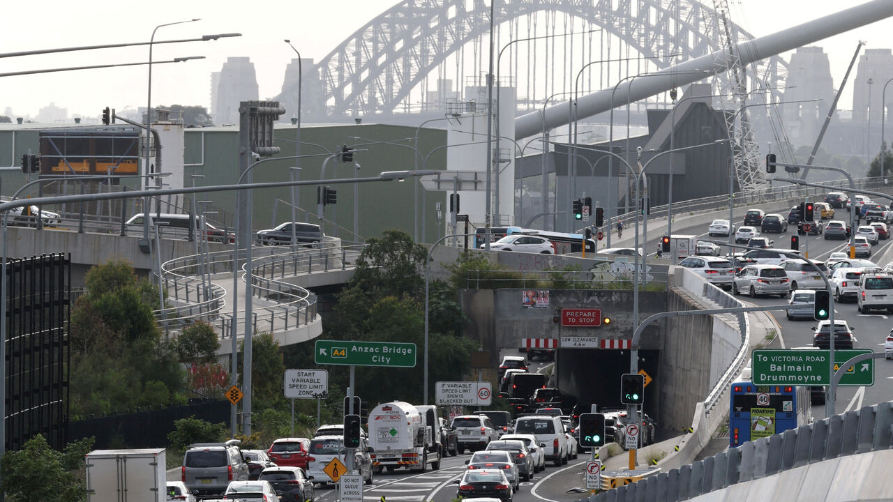 FILE PHOTO: Cars queue to cross Anzac Bridge during peak hour in Sydney, Australia, March 30, 2026. REUTERS/Hollie Adams/File Photo