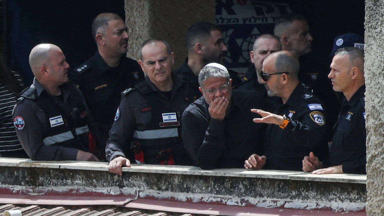 Israeli National Security Minister Itamar Ben-Gvir visits the site of a projectile impact, as the U.S.-Israeli conflict with Iran continues, in Haifa, Israel, April 6, 2026. REUTERS/Shir Torem