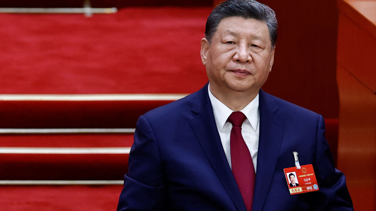 Chinese President Xi Jinping attends the closing session of the National People's Congress (NPC) at the Great Hall of the People in Beijing, China March 12, 2026. REUTERS/Tingshu Wang