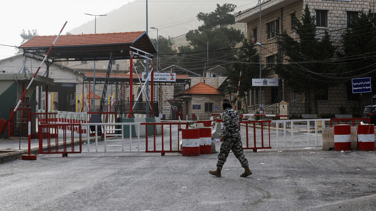 A man walks near the closed Lebanese-Syrian border checkpoint amid escalating hostilities between Israel and Hezbollah, as the U.S.-Israel conflict with Iran continues, near Masnaa, Lebanon, April 5, 2026. REUTERS/Mohamed Azakir