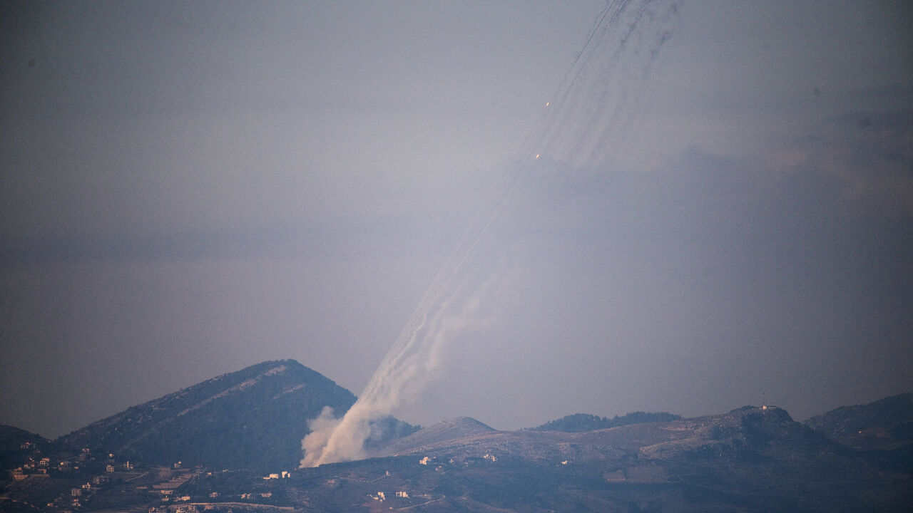 FILE PHOTO: Rockets being launched from Lebanon towards Israel as seen from the Israeli side of the border with Lebanon, following an escalation between Hezbollah and Israel amid the U.S.-Israeli conflict with Iran,  March 3, 2026. REUTERS/Gil Eliyahu/File Photo