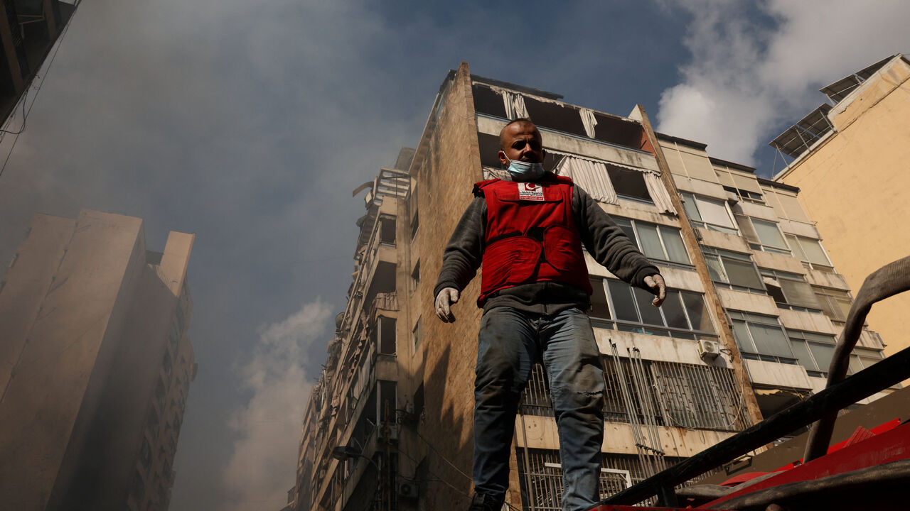 An emergency responder works at the site of an Israeli strike, in Al-Mazraa in Beirut, Lebanon, April 8, 2026. REUTERS/Yara Nardi