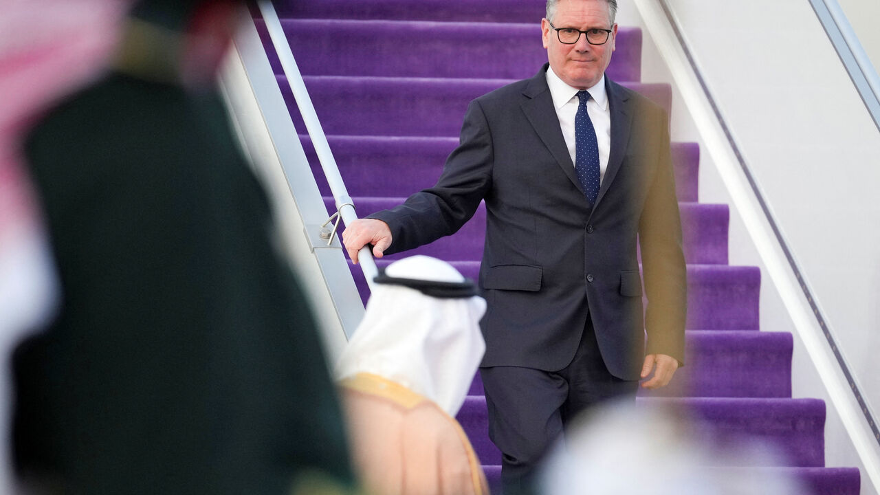 Britain's Prime Minister Keir Starmer is greeted by the Saudi Royal Guard of Honour as he arrives at the airport in Jeddah, Saudi Arabia, April 8, 2026. Alastair Grant/Pool via REUTERS
