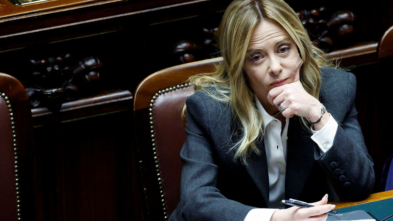 FILE PHOTO: Italy's Prime Minister Giorgia Meloni listens to debate, after she reported on her government’s actions and is expected to speak on the latest developments in Iran, at the lower house of Parliament in Rome, Italy, April 9, 2026. REUTERS/Remo Casilli/File Photo