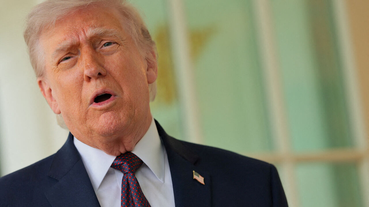 U.S. President Donald Trump speaks with the media at the White House in Washington, D.C., U.S., April 13, 2026. REUTERS/Jonathan Ernst