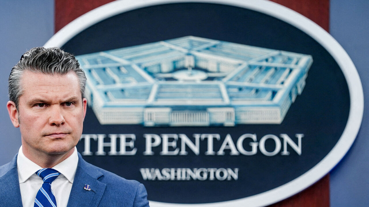 U.S. Secretary of Defense Pete Hegseth looks on during a briefing on the Iran war, at the Pentagon in Washington, D.C., U.S., April 16, 2026. REUTERS/Nathan Howard