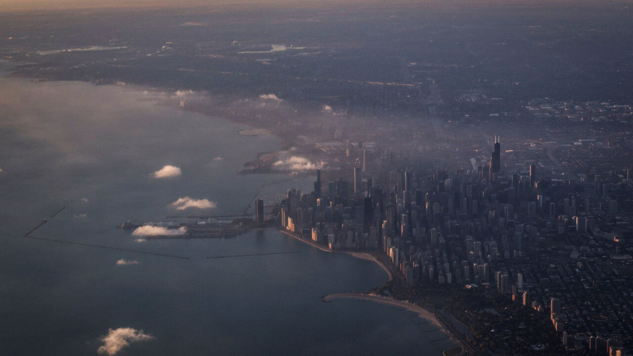 An aerial view shows the skyline and lakefront of Chicago, Illinois, U.S., October 12, 2025. REUTERS/Jeenah Moon