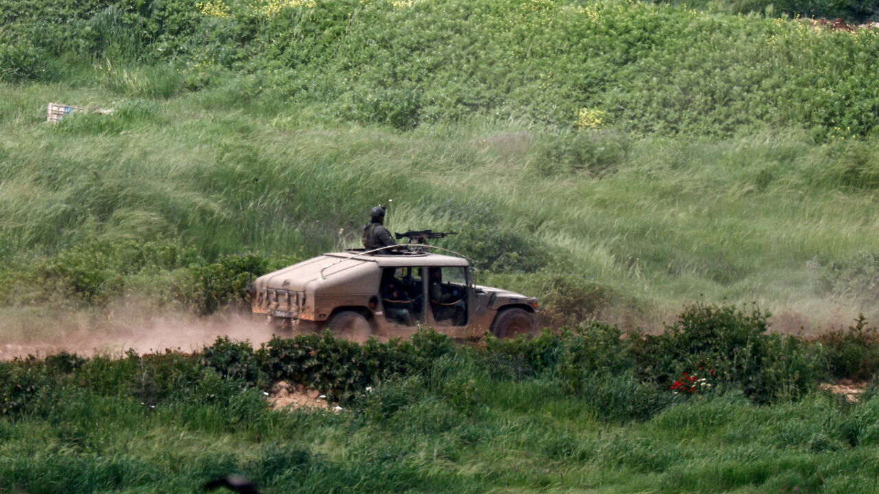 An Israeli military vehicle manouvres in Lebanon, as seen from the Israeli side of the border, April 12, 2026. REUTERS/Amir Cohen