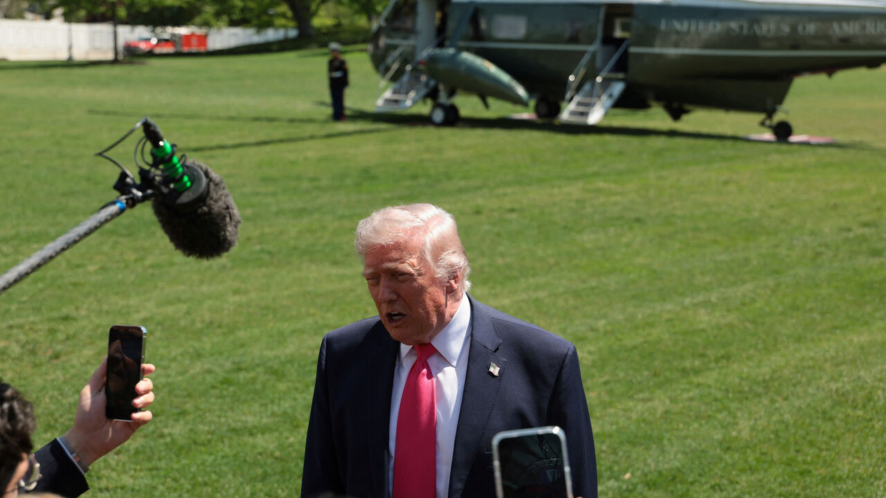 U.S. President Donald Trump speaks to the media, as he departs the White House for Las Vegas, Nevada, in Washington, D.C., U.S., April 16, 2026. REUTERS/Jessica Koscielniak