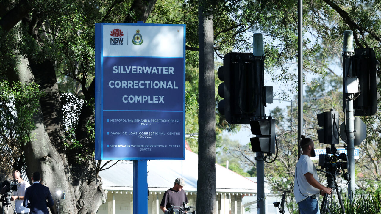 Media wait outside Silverwater Correctional Complex after former Australian Defence Force soldier Ben Roberts-Smith was charged with alleged war crimes committed in Afghanistan, in Sydney, Australia, April 8, 2026. REUTERS/Hollie Adams