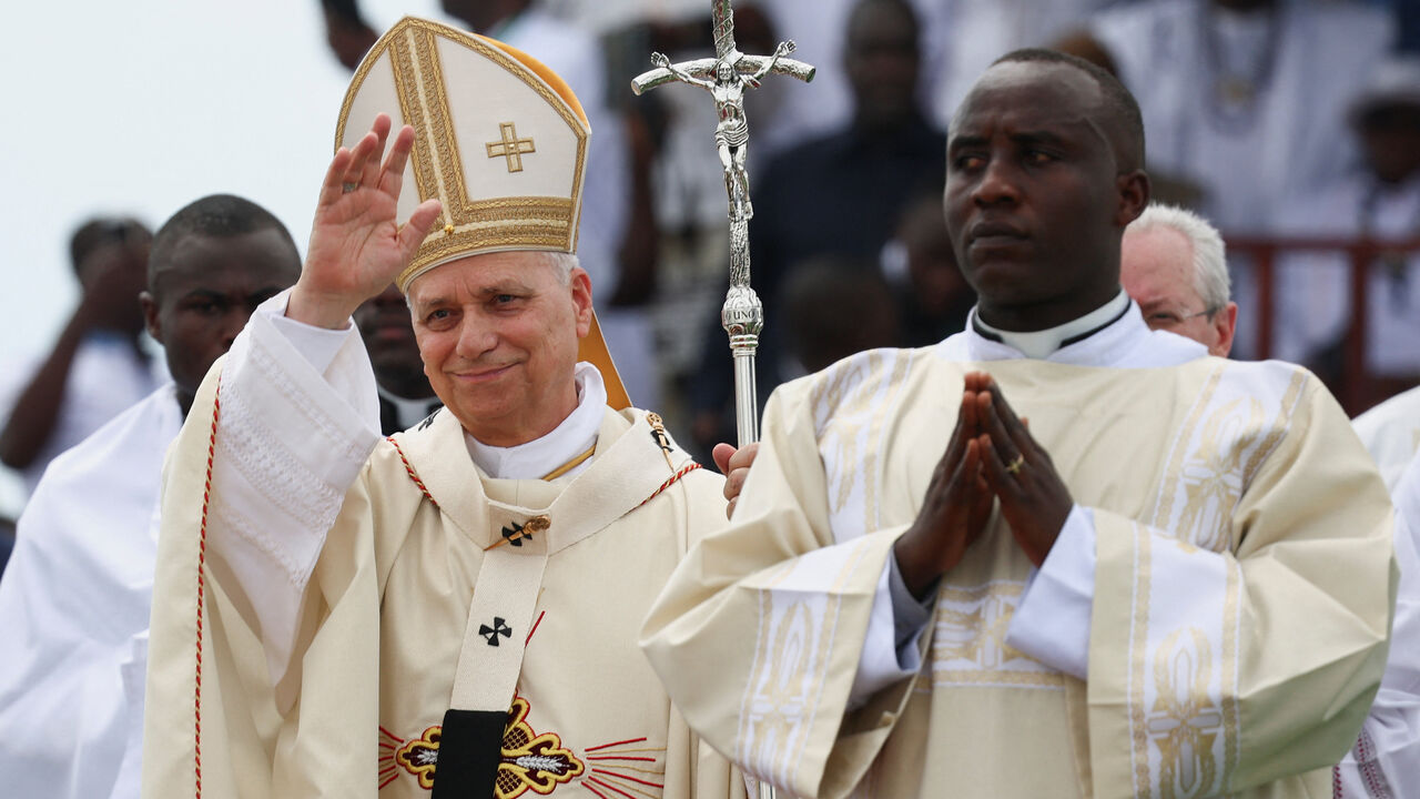 Pope Leo XIV arrives to hold a holy Mass near Japoma Stadium in Douala, Cameroon, April 17, 2026. REUTERS/Guglielmo Mangiapane