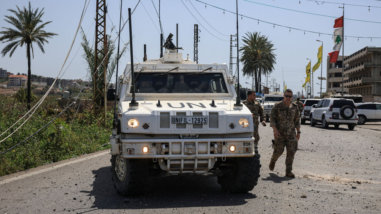 United Nations Interim Force in Lebanon (UNIFIL) peacekeepers and members of the Lebanese army arrive at the site, after an Israeli strike severed the last remaining bridge linking southern Lebanon to the rest of the country, in Qasmiyeh, Lebanon April 16, 2026. REUTERS/Louisa Gouliamaki