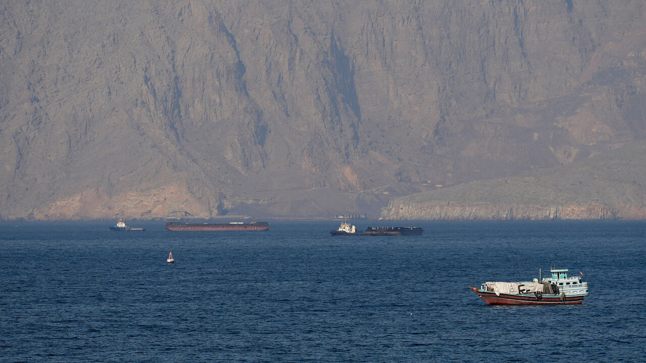 Ships and tankers in the Strait of Hormuz off the coast of Musandam, Oman, April 18, 2026. REUTERS/Stringer