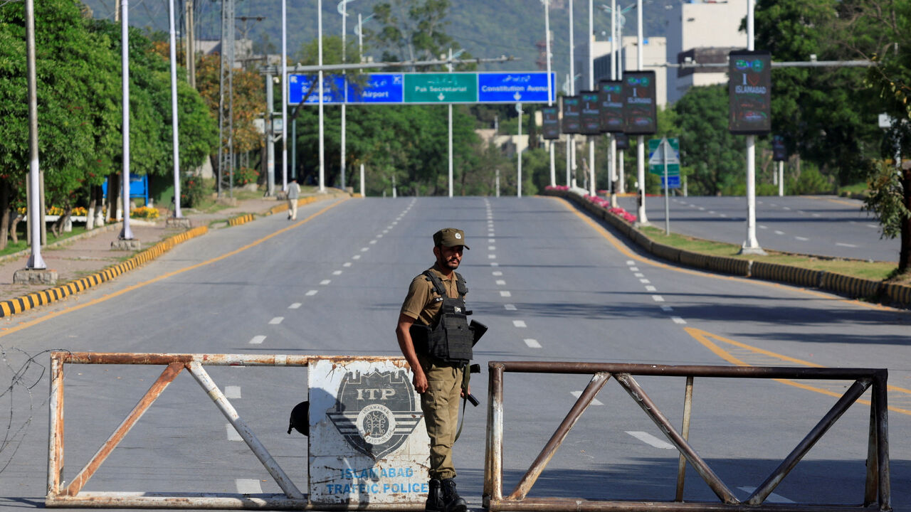A Pakistani Army soldier stands guard on a road leading to Serena hotel, the venue for the second phase of peace talks between the United States and Iran hosted by Pakistan, in Islamabad, Pakistan, April 20, 2026. REUTERS/Akhtar Soomro