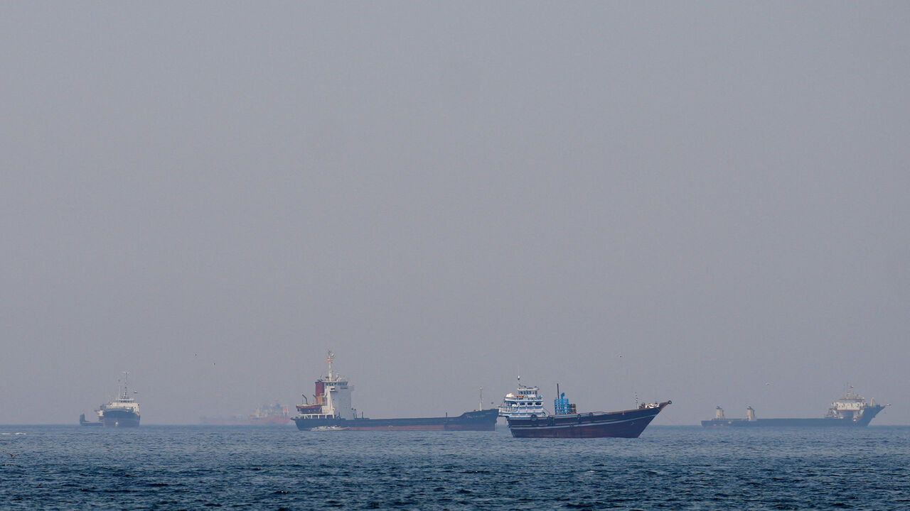 FILE PHOTO: Ships and boats in the Strait of Hormuz off the coast of Musandam, Oman, April 20, 2026. REUTERS/File Photo