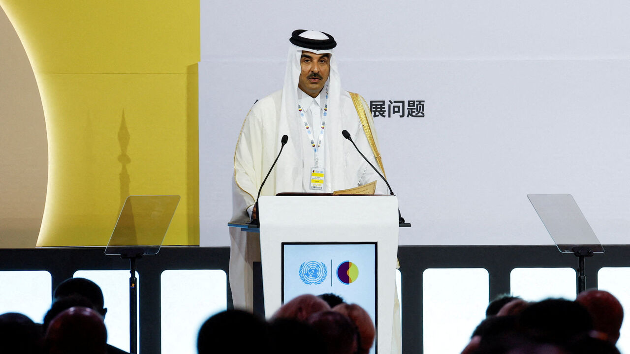 Qatar's Emir Sheikh Tamim bin Hamad Al Thani speaks at the Second World Summit for Social Development, focusing on advancing social development and reaffirming commitments to the Copenhagen Declaration, in Doha, Qatar, November 4, 2025. REUTERS/Ibraheem Abu Mustafa