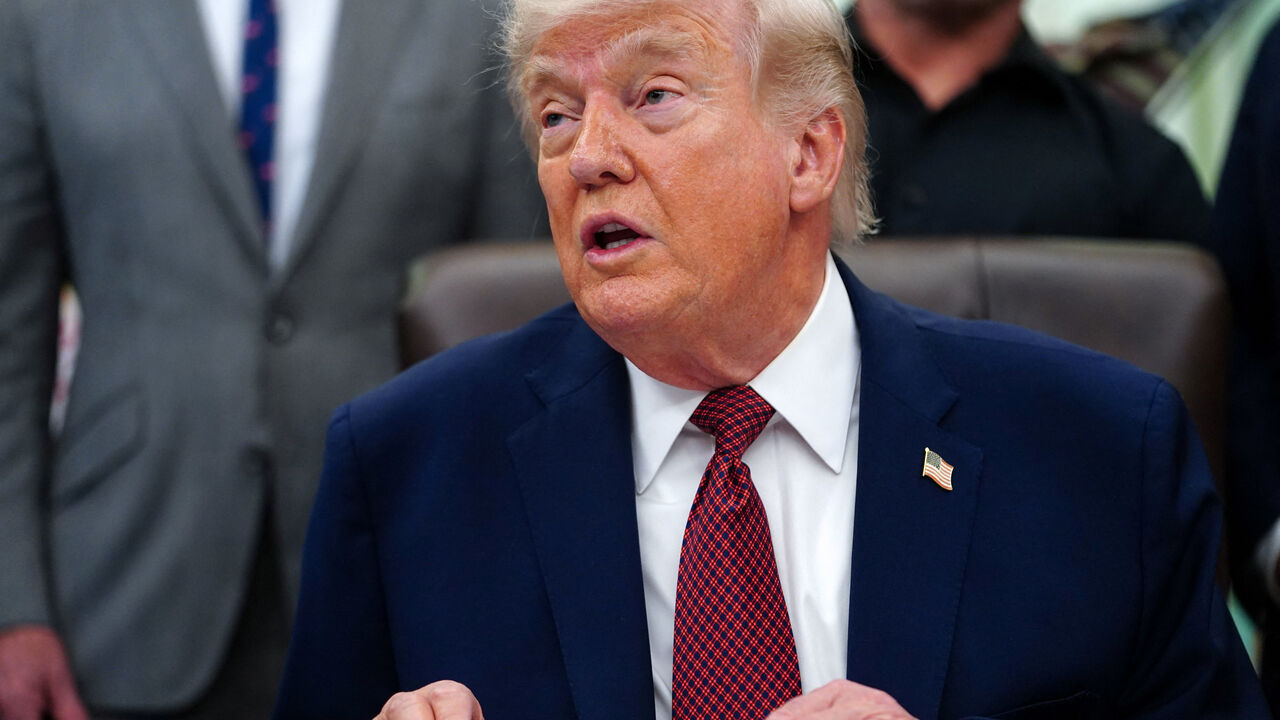 FILE PHOTO: U.S. President Donald Trump speaks about research into mental health treatments in the Oval Office of the White House in Washington, D.C., April 18, 2026. REUTERS/Nathan Howard/File photo