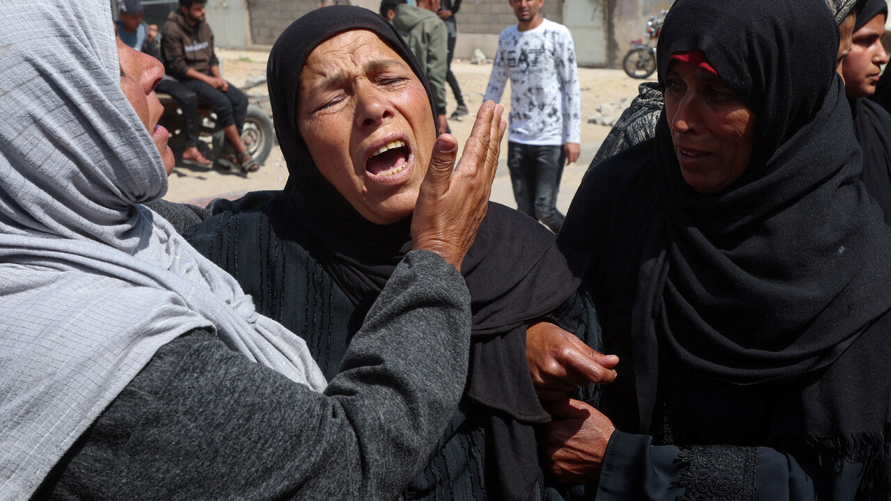 Mourners react during the funeral of Palestinian child Adel Al-Najjar, who was killed today in an Israeli strike, according to medics, at Nasser Hospital in Khan Younis, in the southern Gaza Strip, April 28, 2026. REUTERS/Ramadan Abed