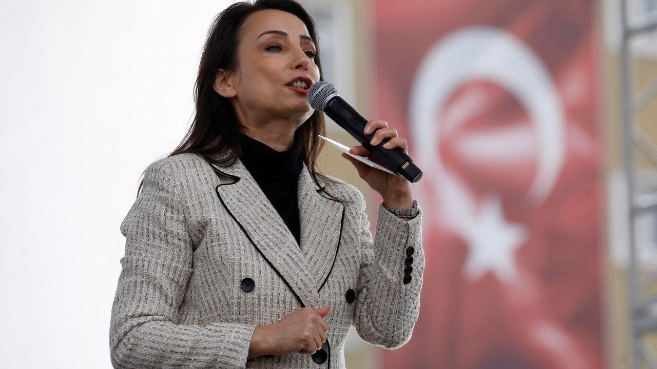 Tulay Hatimogullari, co-chair of pro-Kurdish Peoples' Equality and Democracy Party (DEM Party), addresses their supporters during a rally in Istanbul, Turkey, February 2, 2025. REUTERS/Dilara Senkaya