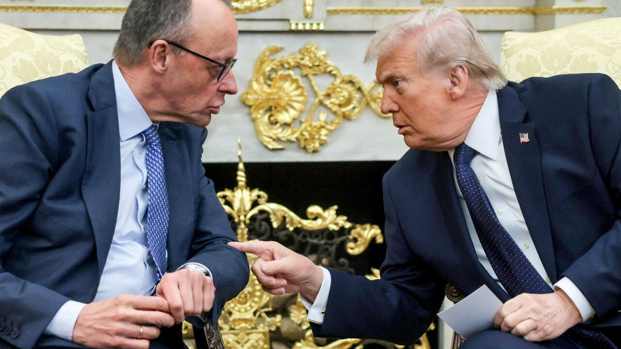 FILE PHOTO: U.S. President Donald Trump and German Chancellor Friedrich Merz meet in the Oval Office at the White House in Washington, D.C., U.S., March 3, 2026. REUTERS/Jonathan Ernst/File Photo