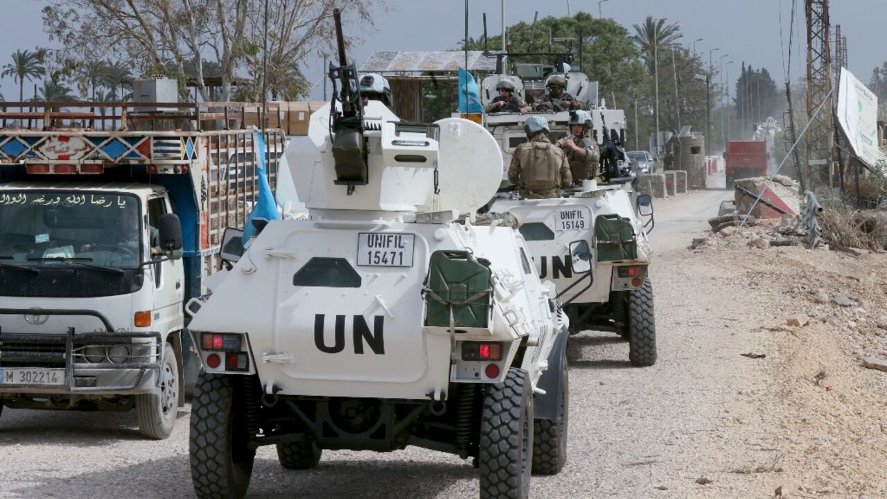 French peacekeepers with the United Nations Interim Force in Lebanon cross the Qasmiyeh Bridge towards Sidon and Beirut