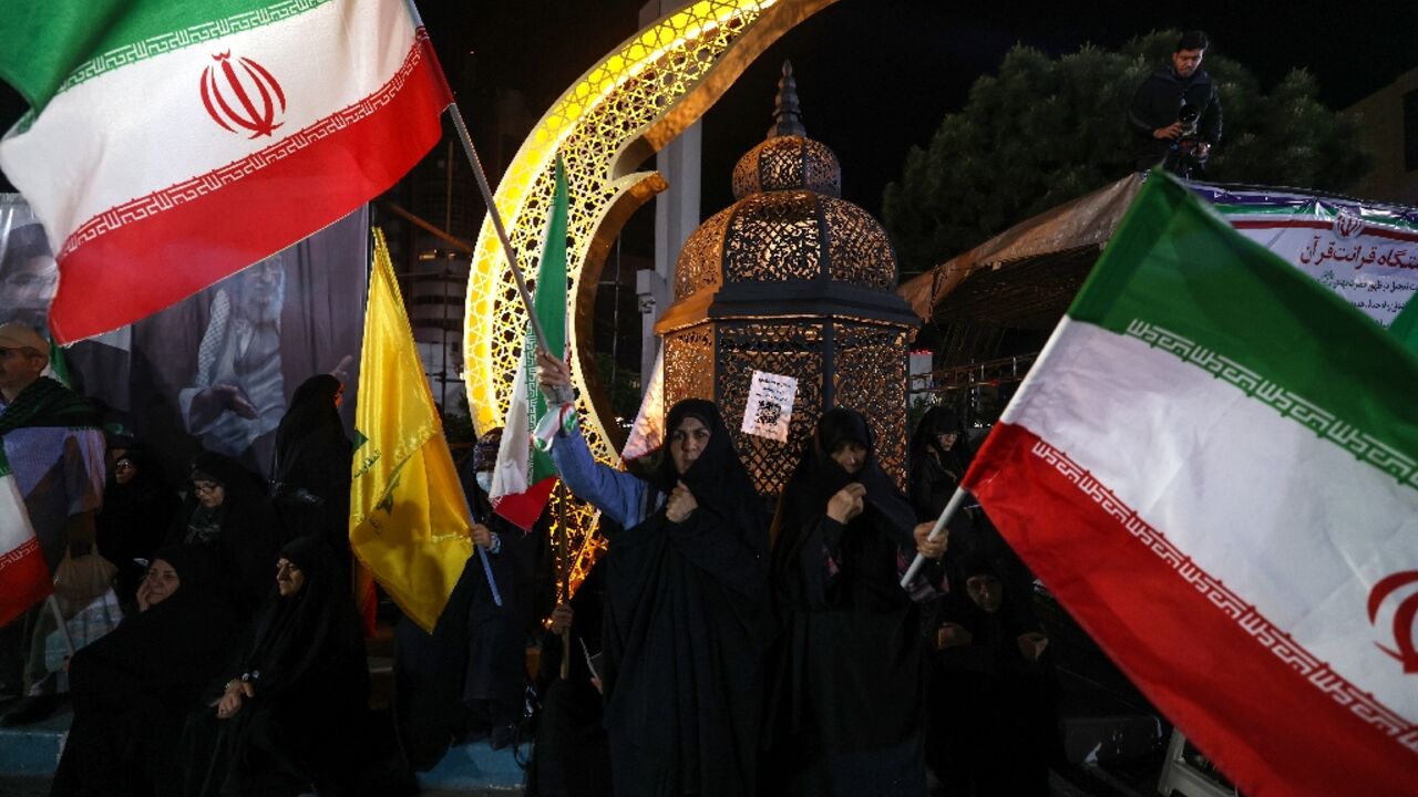 Demonstrators rally in support of Iran's supreme leader Ayatollah Mojtaba Khamenei at Sadeghyeh Square in Tehran on April 27, 2026
