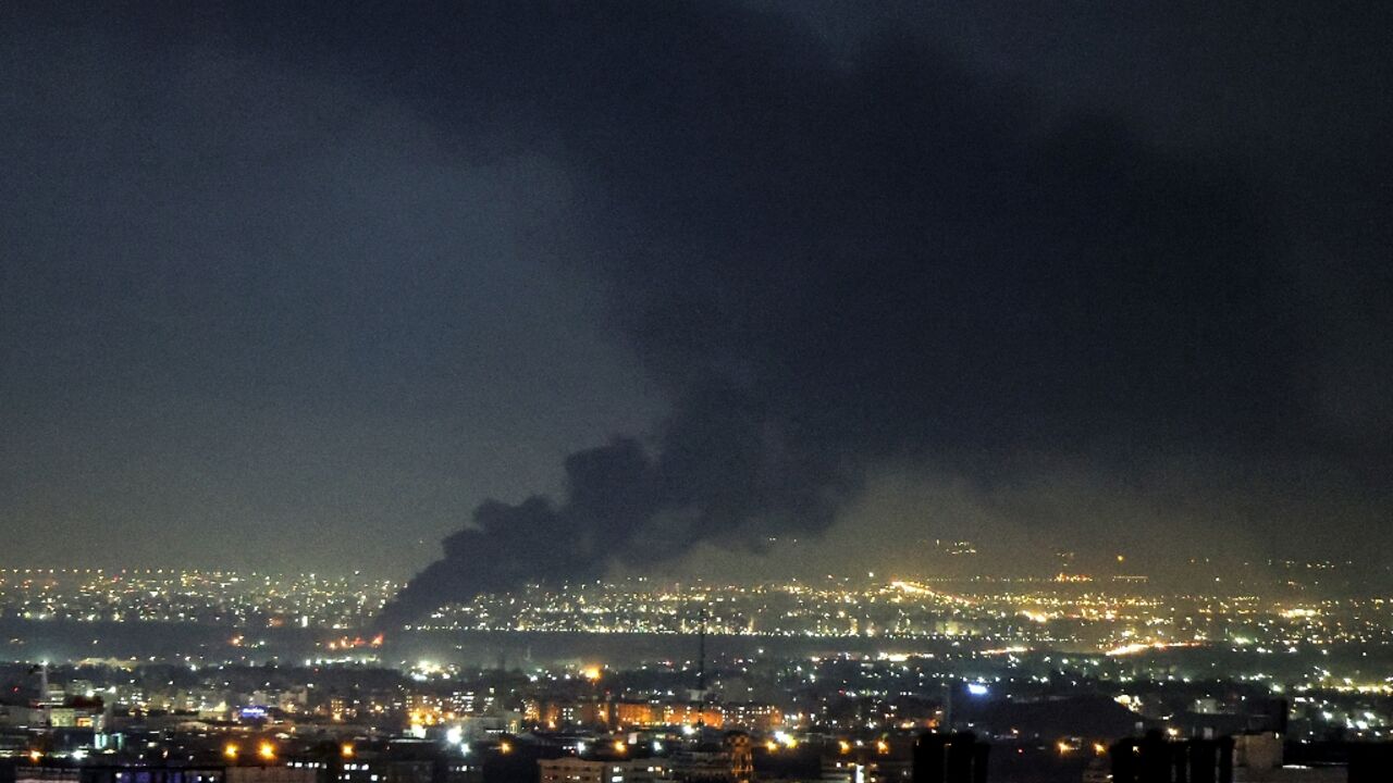 Smoke rises from the site of a US-Israeli strike on the Iranian capital Tehran on April 7, 2026