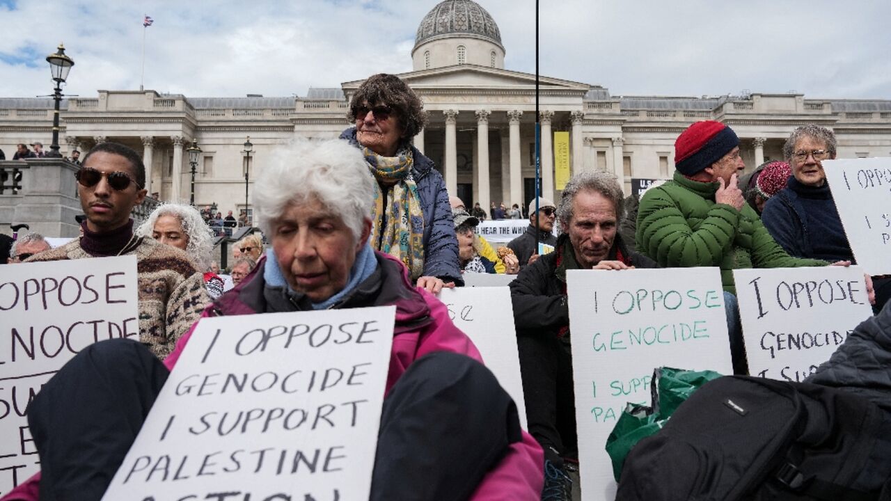 Many of the protesters held placards supporting the banned group, making them liable for arrest