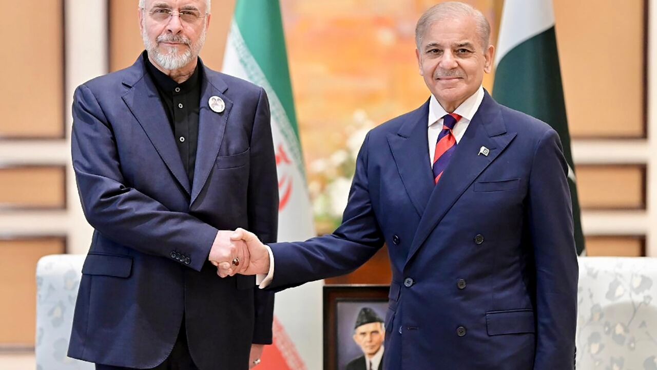 Ghalibaf (L), here shaking hands with Pakistan's Prime Minister Shehbaz Sharif (R) is a key figure in the talks