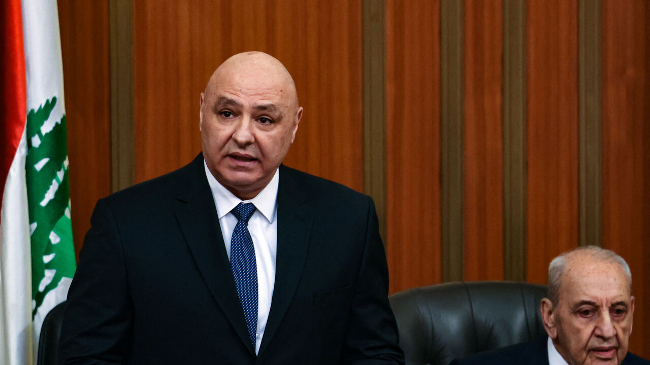 Lebanese president Joseph Aoun (L) stands next to the parliament speaker Nabih Berri as he delivers a speech at the parliament building in Beirut Jan. 9, 2025.  