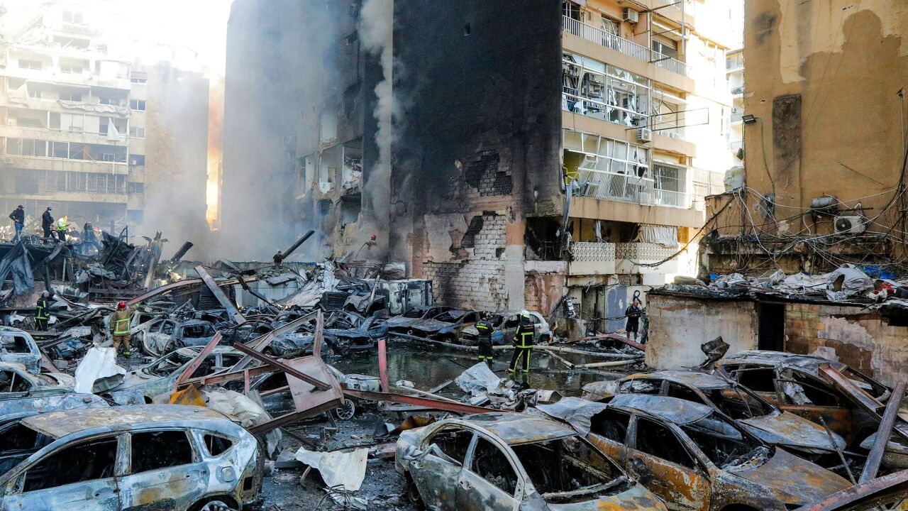 Firefighters attempt to extinguish a fire following an Israeli strike at the Corniche al-Mazraa neighbourhood of Beirut on April 8, 2026. 