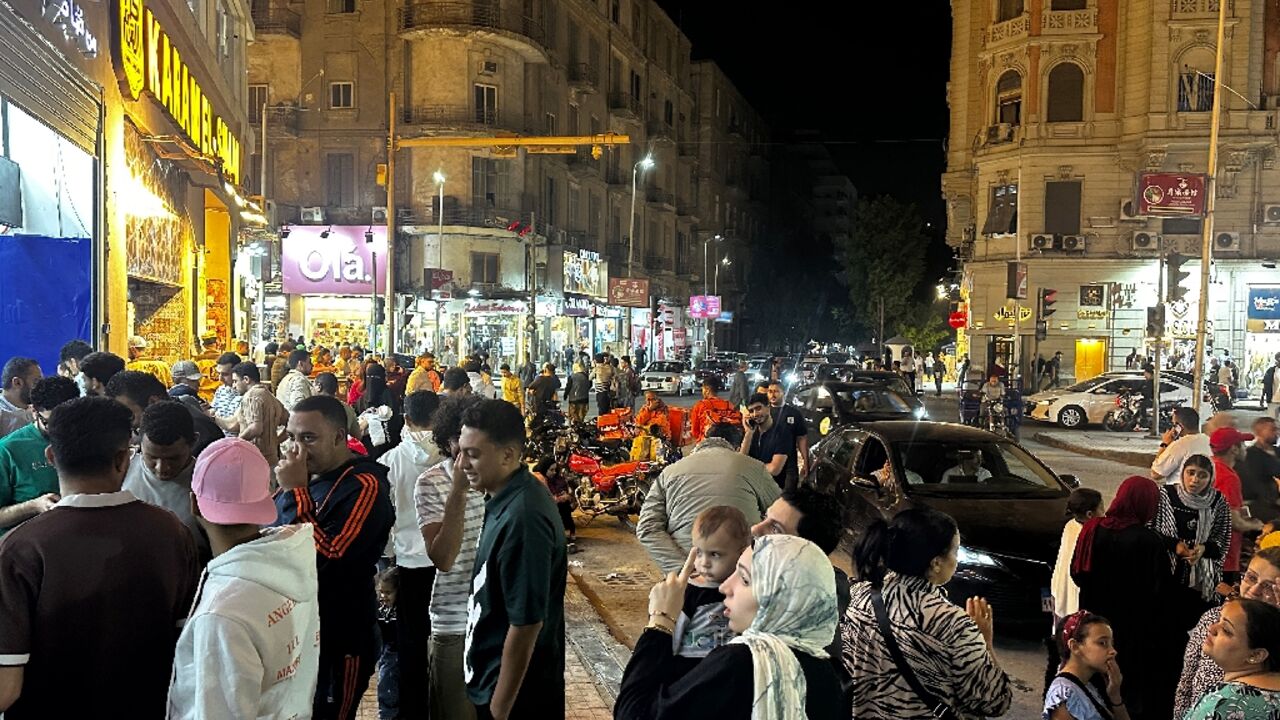 Cairo's famed nocturnal rhythm flickered back to life on Tuesday after Egypt eased energy-saving measures spurred by the Middle East war that had forced shops, cafes and restaurants to close early