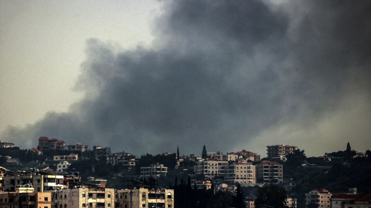 Smoke rises from the site of an Israeli airstrike that targeted the southern Lebanese town of Deir al-Zahrani on April 15, 2026