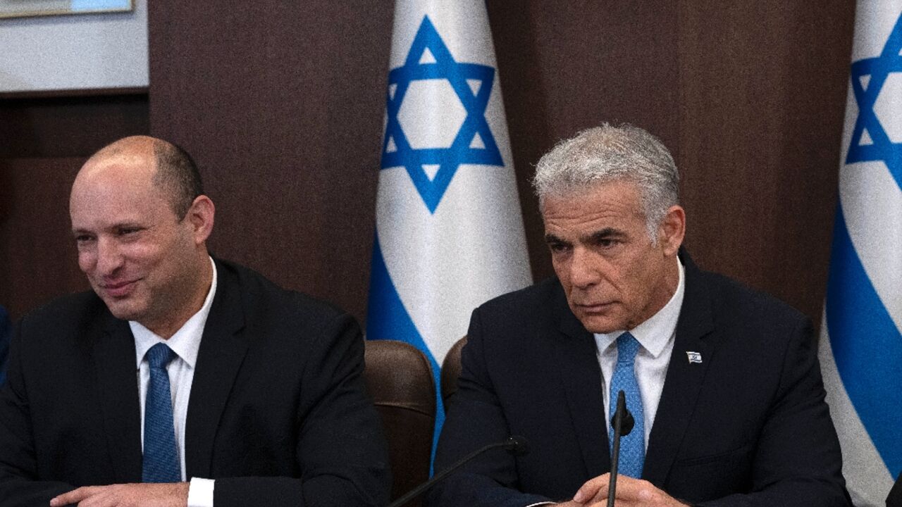Israeli opposition figures Naftali Bennett and Yair Lapid, seen here in 2022, have both  been outspoken critics of Prime Minister Benjamin Netanyahu's handling of the Gaza war and beyond