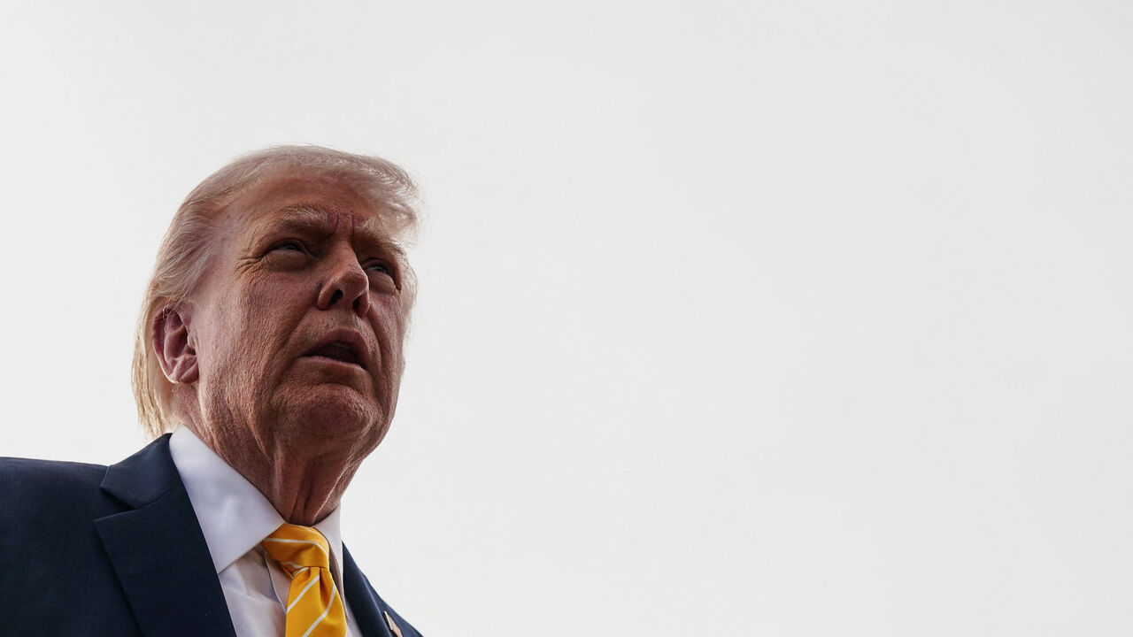 U.S. President Donald Trump speaks to the media before boarding Air Force One for departure to Miami, Florida, at Palm Beach International Airport in West Palm Beach, Florida, U.S., May 2, 2026. REUTERS/Nathan Howard
