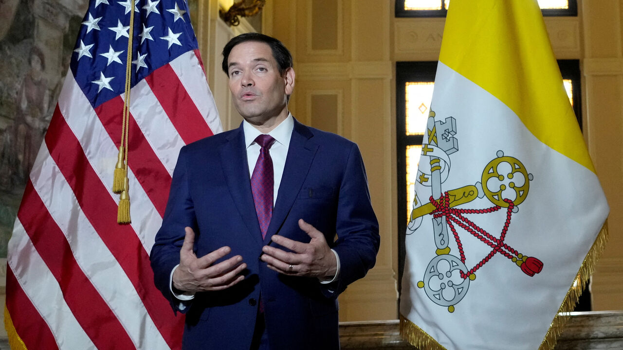 FILE PHOTO: Secretary of State Marco Rubio, speaks to the media during a meeting with President of the Conference of Italian Bishops, Cardinal Matteo Zuppi at the U.S. Embassy to the Holy See in Rome, Saturday, May 17, 2025. Gregorio Borgia/Pool via REUTERS/File Photo