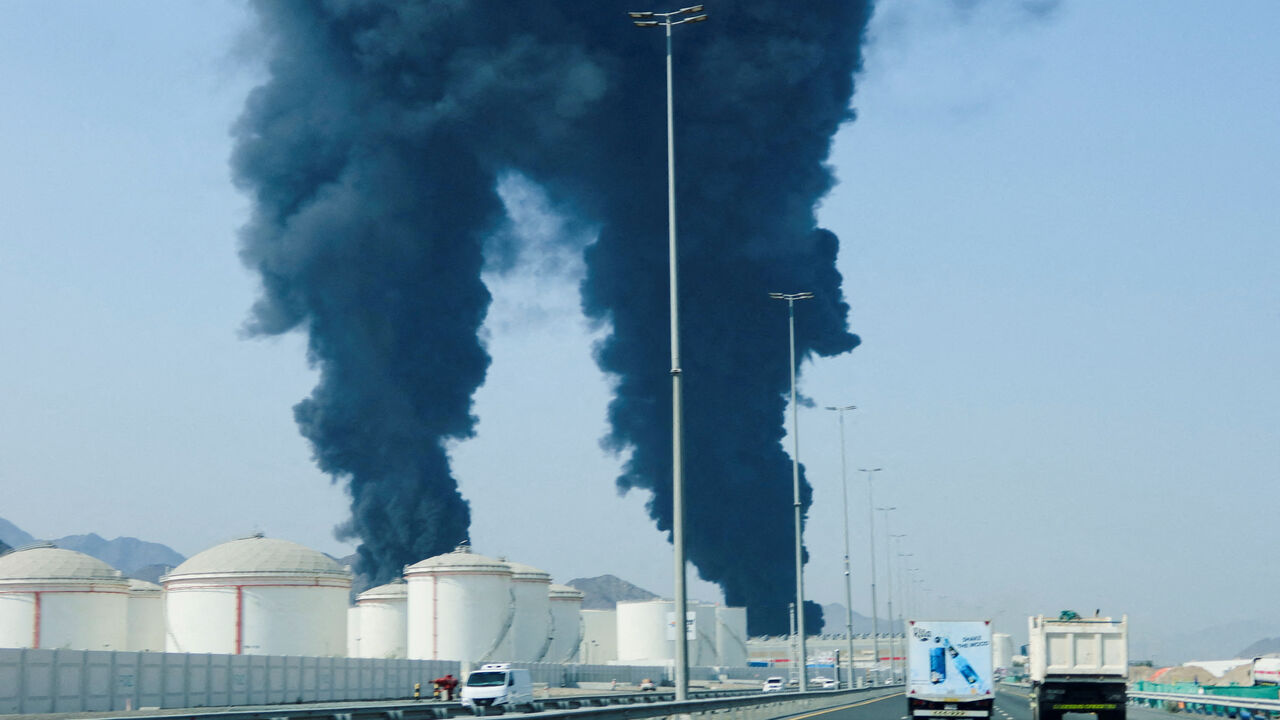 FILE PHOTO: Smoke rises in the Fujairah oil industry zone, caused by debris after interception of a drone by air defenses, according to the Fujairah media office, amid the U.S.-Israel conflict with Iran, in Fujairah, United Arab Emirates, March 14, 2026. REUTERS/Staff/File Photo